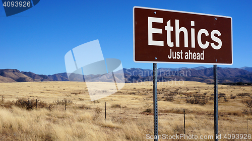 Image of Ethics brown road sign