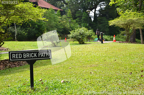 Image of Singapore Botanic Garden With red brick path