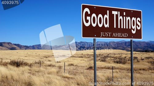 Image of Good Things Just Ahead brown road sign