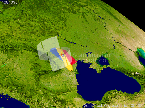 Image of Moldova with flag on Earth