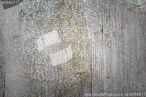 Image of detail of cracked painted surface on wood