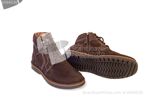 Image of Mens shoes for winter on a white background.