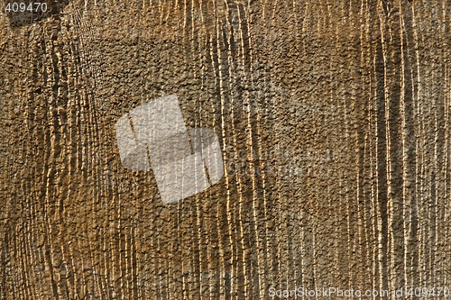 Image of Streams of water running over stone wall