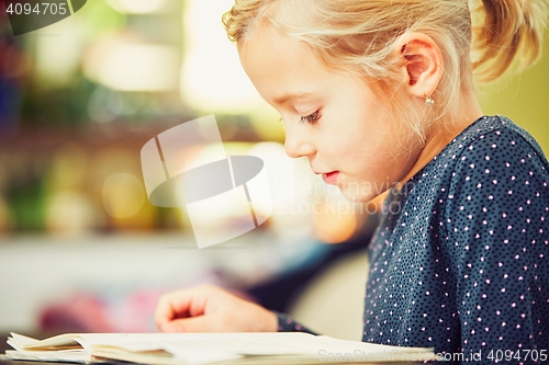 Image of Girl is doing homework