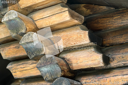 Image of Fragment of the wall executed from processed natural round logs.