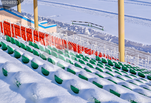 Image of Background chairs at stadium , winter