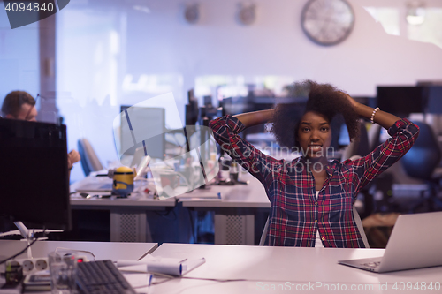 Image of portrait of a young successful African-American woman in modern 