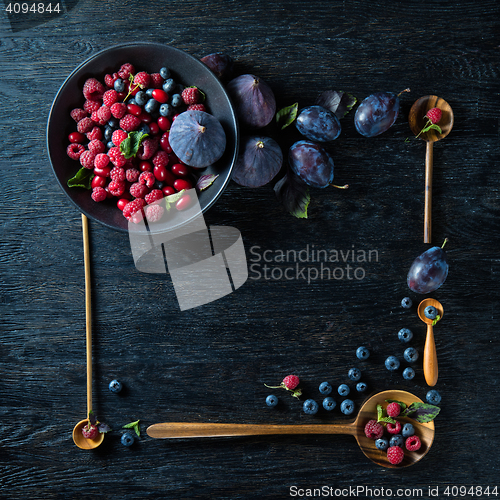 Image of frame with berries and figs