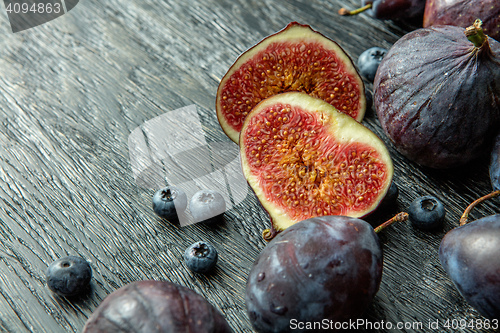 Image of ripe berries and sliced figs