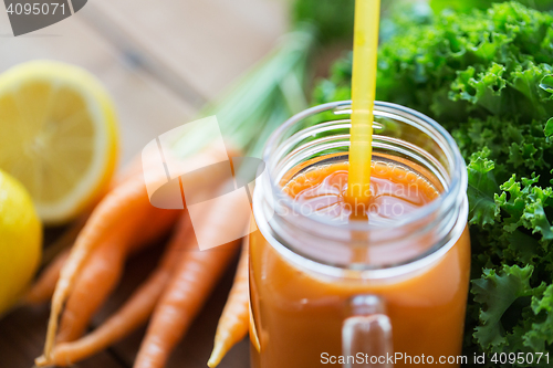 Image of close up of carrot juice, fruits and vegetables