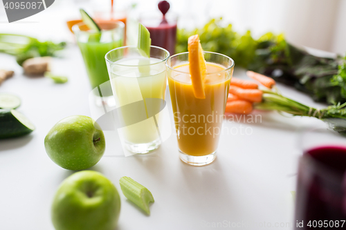 Image of glasses with different fruit or vegetable juices