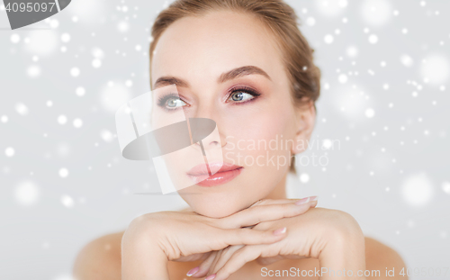 Image of close up of beautiful young woman face and hands