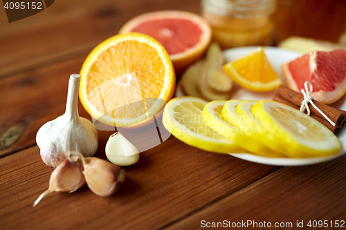 Image of garlic, lemon, orange and other folk remedy