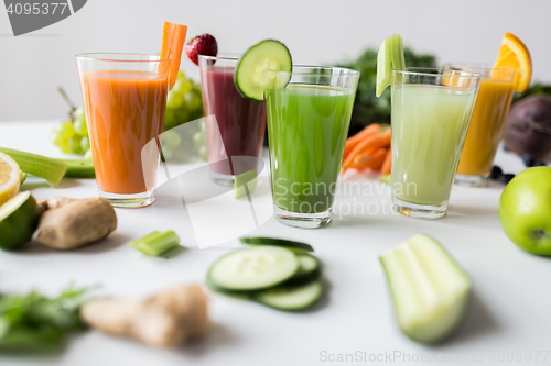 Image of glasses with different fruit or vegetable juices