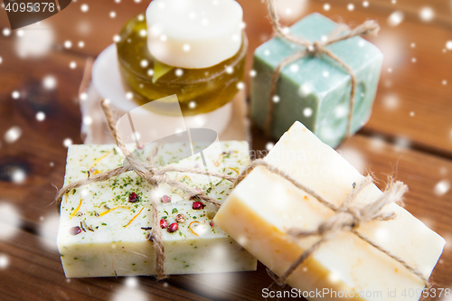 Image of close up of handmade soap bars on wood