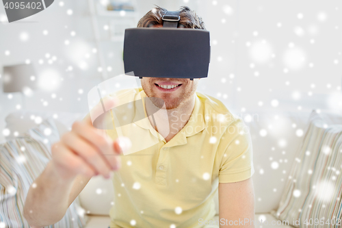 Image of young man in virtual reality headset or 3d glasses