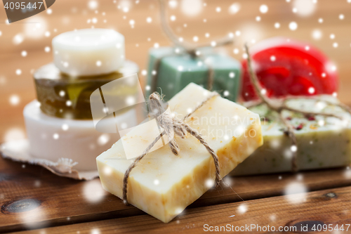 Image of close up of handmade soap bars on wood