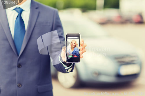 Image of close up of business man with smartphone call