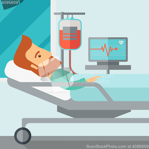 Image of Patient in hospital bed being monitored