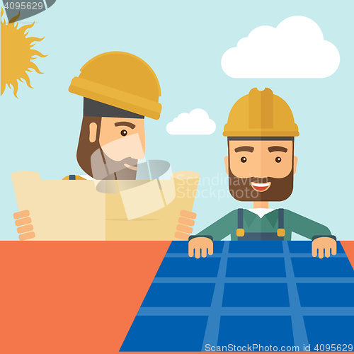 Image of Man putting a solar panel on the roof.