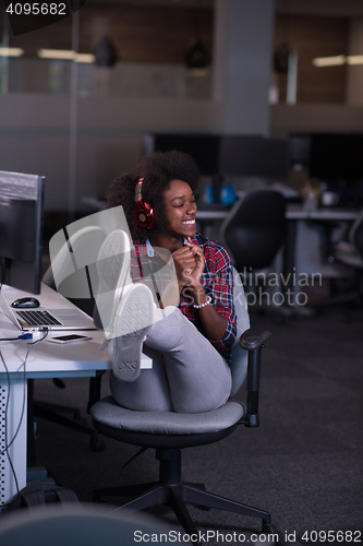 Image of portrait of a young successful African-American woman in modern 