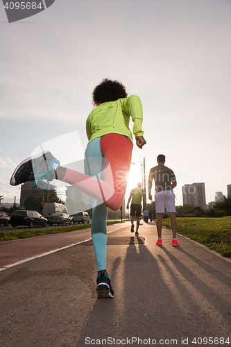 Image of multiethnic group of people on the jogging