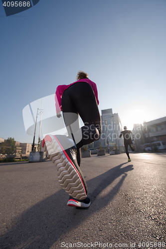 Image of young  couple jogging