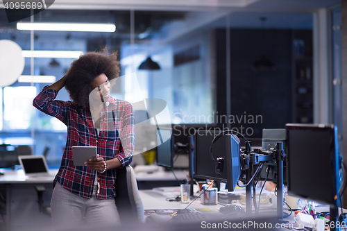 Image of portrait of a young successful African-American woman in modern 