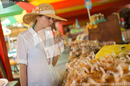 Image of Traveler shopping on traditional Victoria food market, Seychelles.