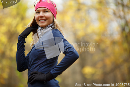 Image of Beautiful girl in sport clothes