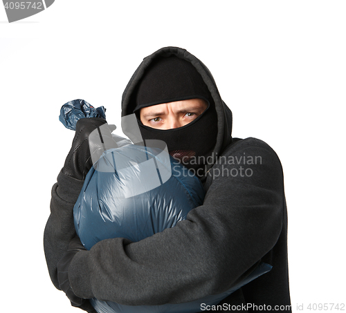 Image of Terrible robber grabbed large bag