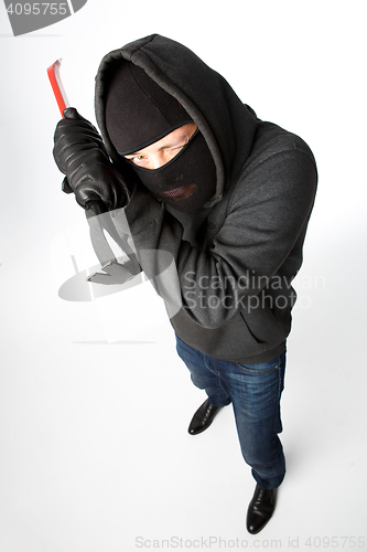 Image of Burglar winks in black mask