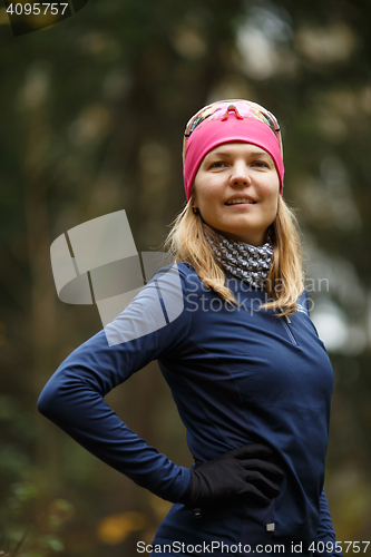 Image of Portrait of smiling sporty woman