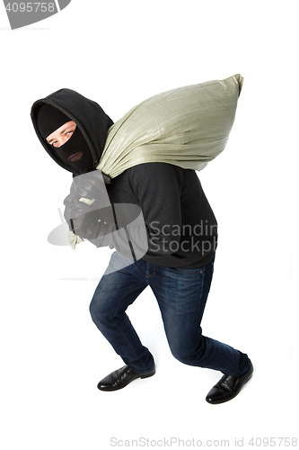 Image of Thief with heavy black bag