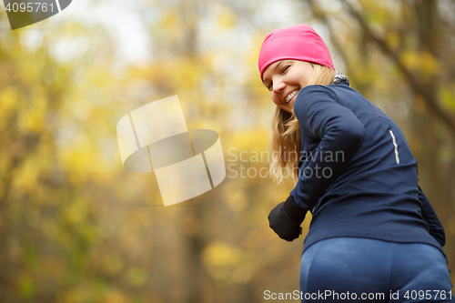 Image of Smiling girl on morning jog