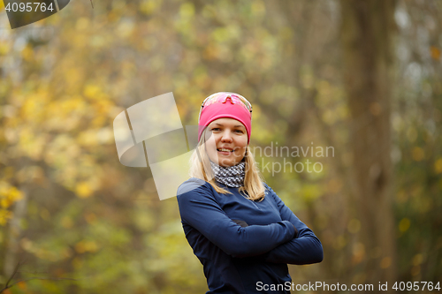 Image of Young sporty woman in forest