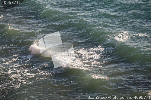 Image of Coastal waves of the black sea on sunny day