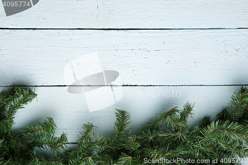 Image of Christmas and new year background with fir tree from bottom