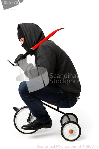 Image of Burglar going on little bicycle