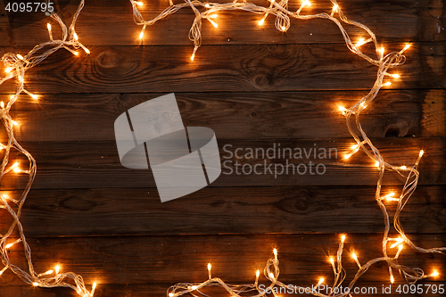 Image of Festive Christmas and new year dark brown wooden background