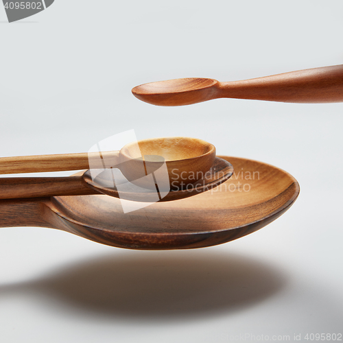 Image of different wood spoon isolated in air