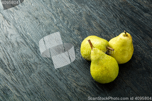 Image of Pears on wooden background