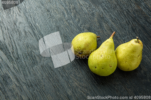 Image of Pears on wooden background