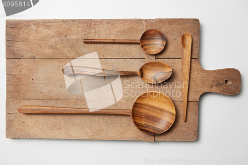 Image of Kitchenware set of wooden plate,  spoons,  knife