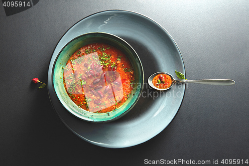 Image of red bean soup in a bowl with  spoon