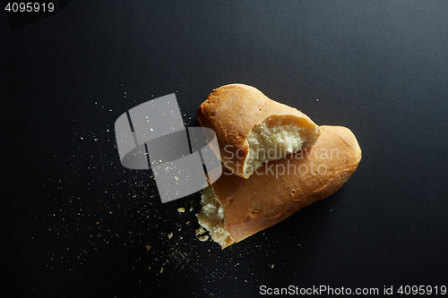 Image of Fresh baked bread loaf broken