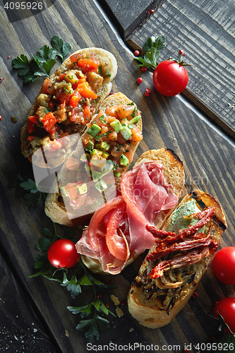 Image of Assorted Italian appetizer bruschetta