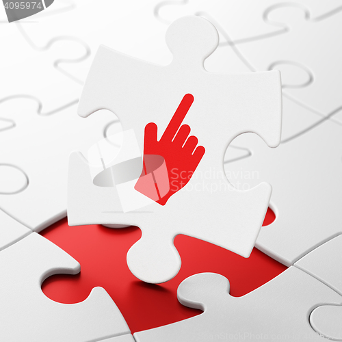 Image of Web development concept: Mouse Cursor on puzzle background
