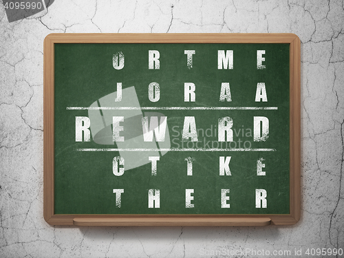 Image of Finance concept: Reward in Crossword Puzzle