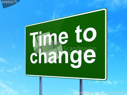 Image of Time concept: Time to Change on road sign background